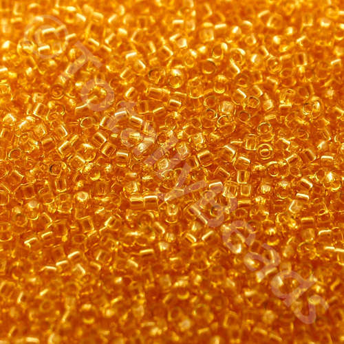 Toho Size 15 Seed Beads 10g - Transparent Lt Topaz