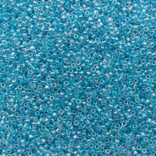 Toho Treasure Size 11 5g - Inside-Colour Rainbow Crystal/Opaque Aqua