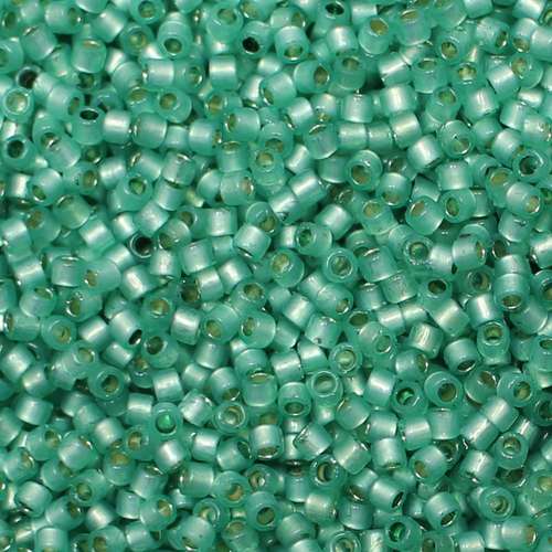 Toho Treasure Size 11 5g - PF Silver Milky Dk Peridot
