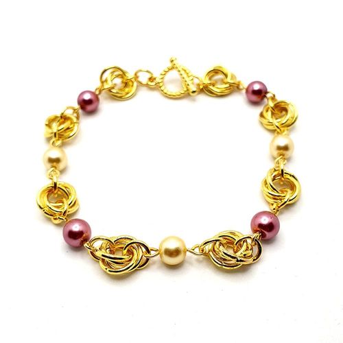 Mobius Pearl Bracelet Makes 6 pink peach bracelet making kit — DIY set with beads and instructions for creating handmade jewelry