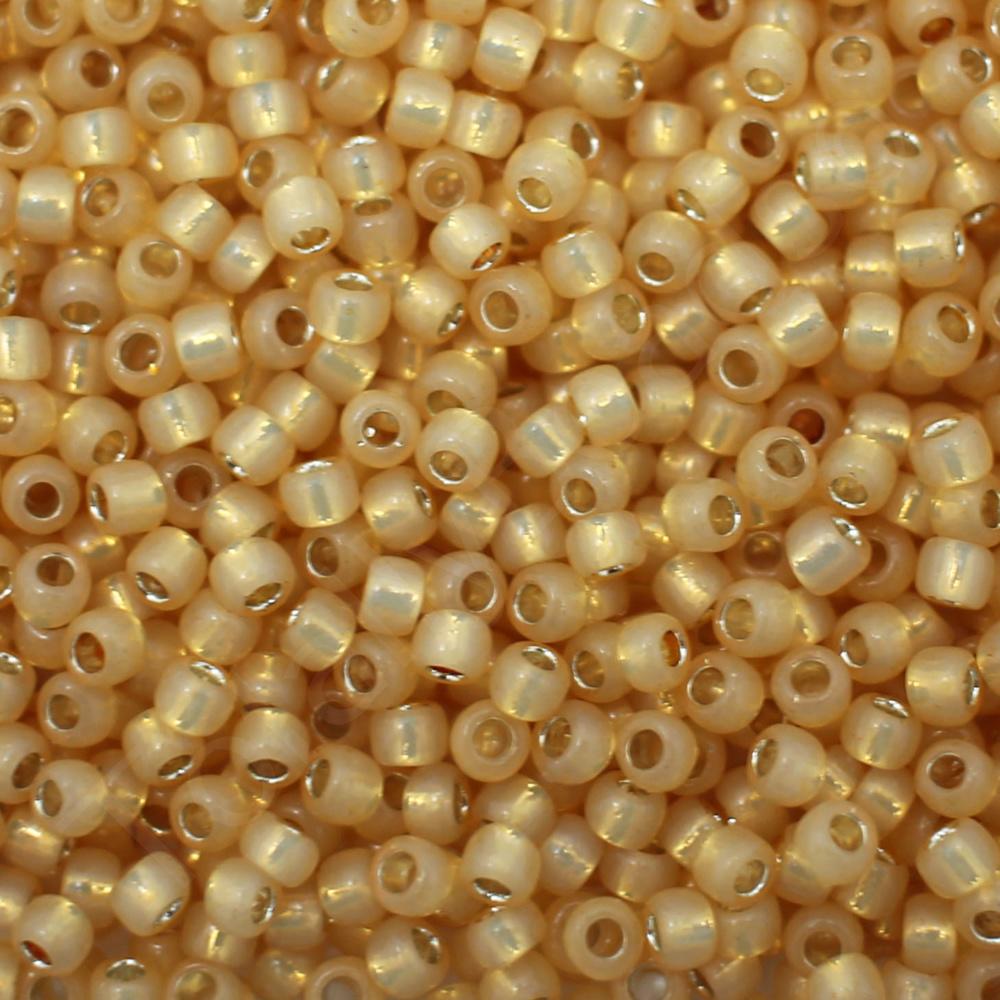 Toho Size 8 Seed Beads 10g - Silver Line Milky Lt Topaz