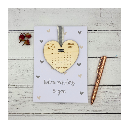 wooden keepsake card with date met engraved on a heart