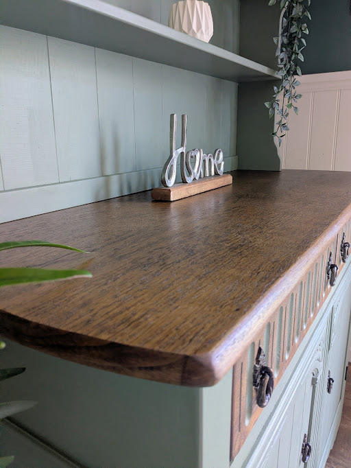 green dresser with wood top