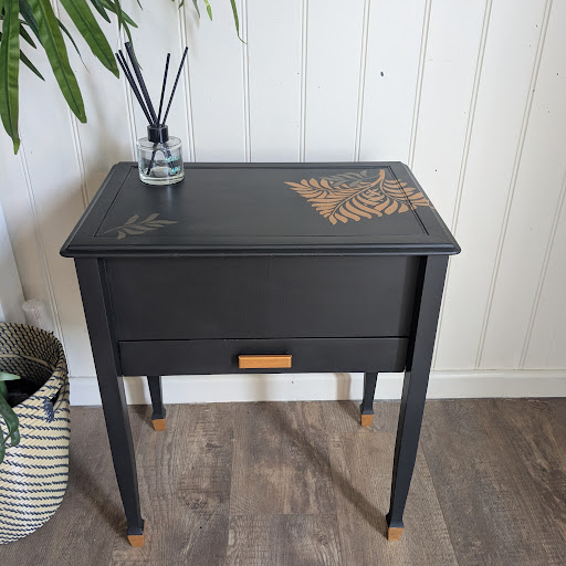 Black and gold sewing box table