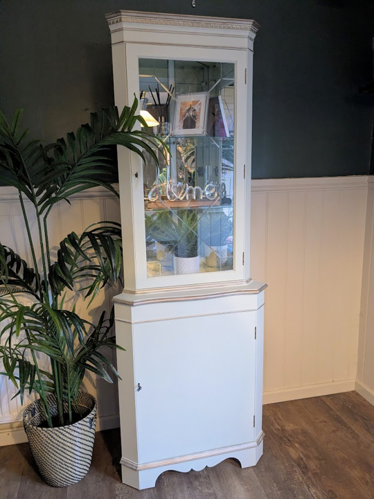 painted corner cabinet in light green