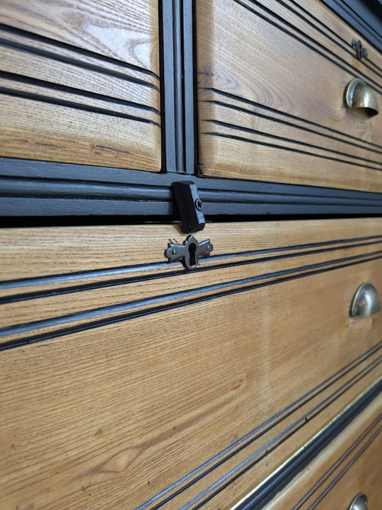 black and wood storage cupboard
