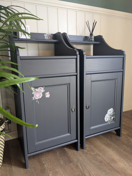 pair of blue side cabinets