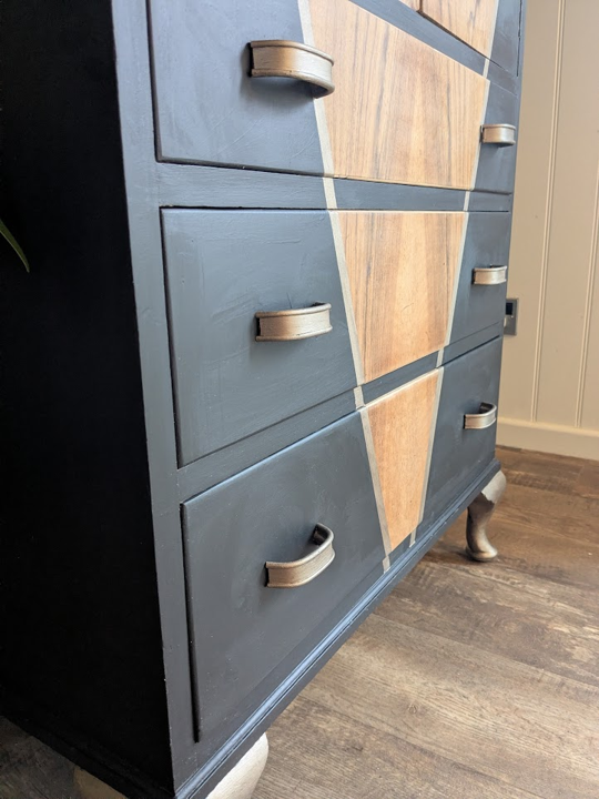mid century black and gold cabinet
