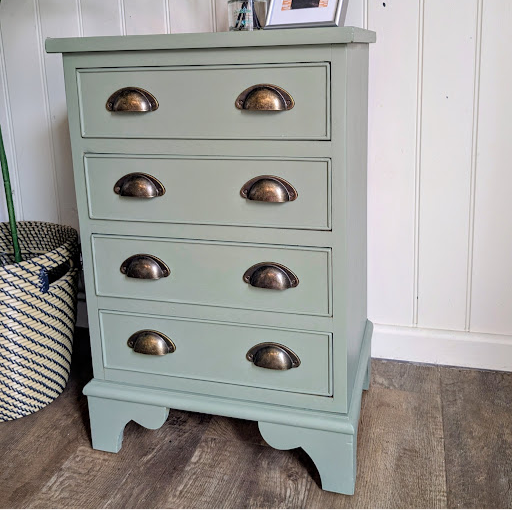 single green bedside cabinet side on