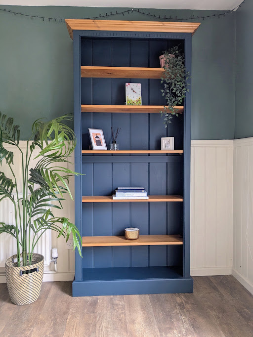 Dark blue painted bookcase