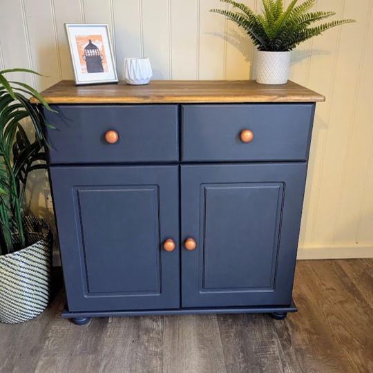 dark wood and blue storage cupboard