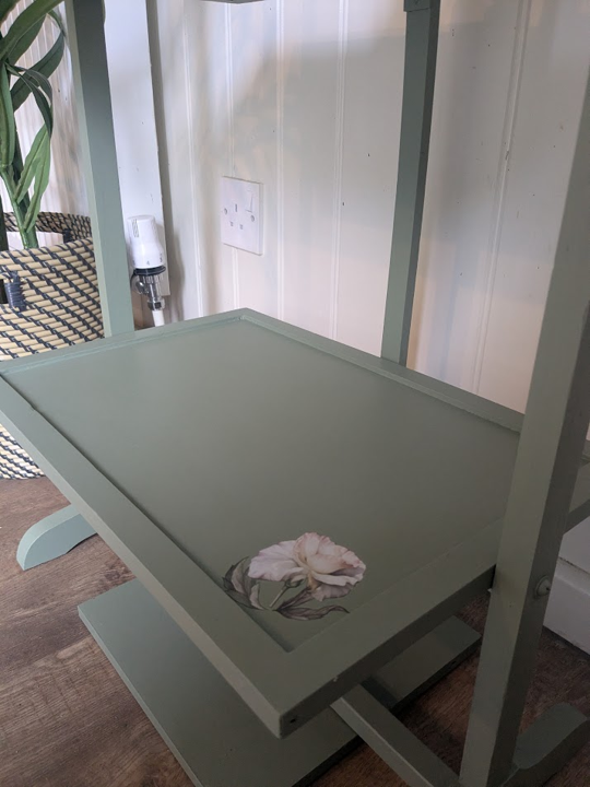 vintage green table with floral detail
