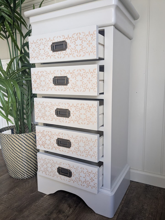 narrow stencilled grey chest of drawers