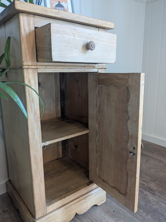 slim wooden cupboard