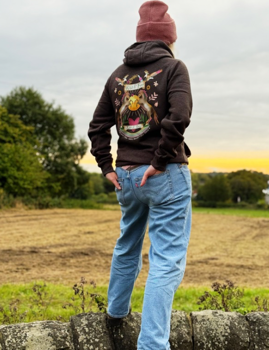 Woman wearing Wild and Free Zip Hoodie in vintage charcoal