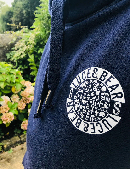 Close up of unisex navy Power cross neck hoodie
