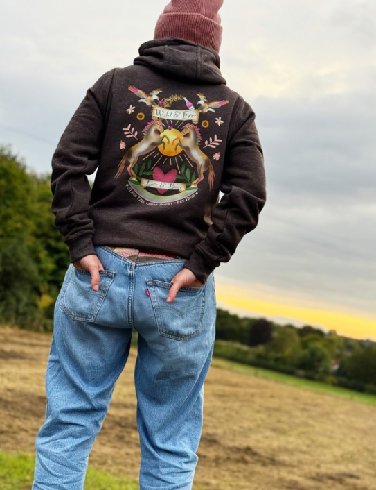 Woman wearing Wild and Free Zip Hoodie in vintage charcoal