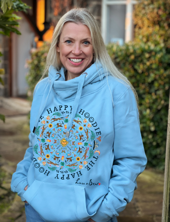 Woman wearing pale blue Happy Hoodie
