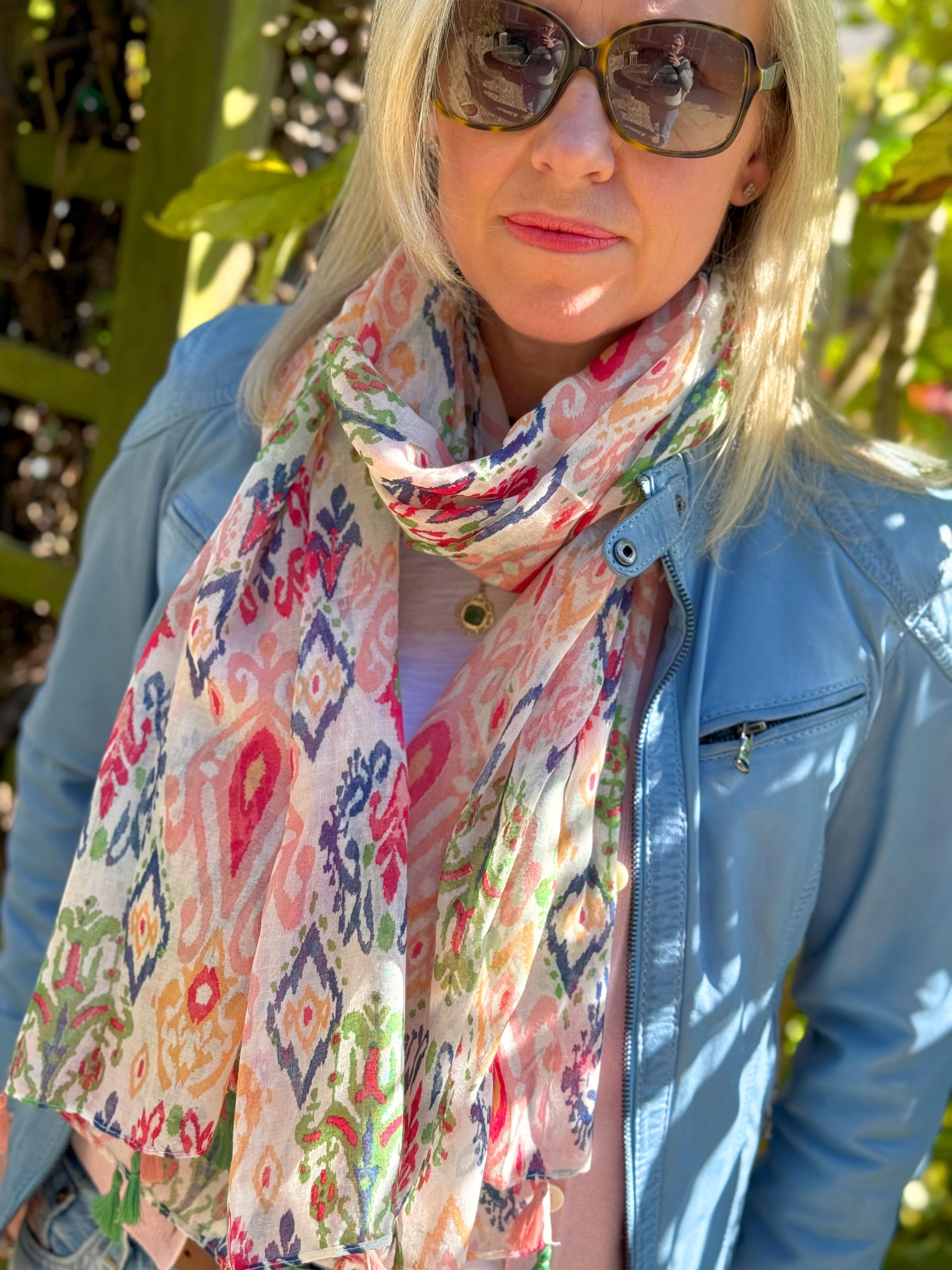 Close up of woman wearing patterned abstract Ikat lightweight summer scarf