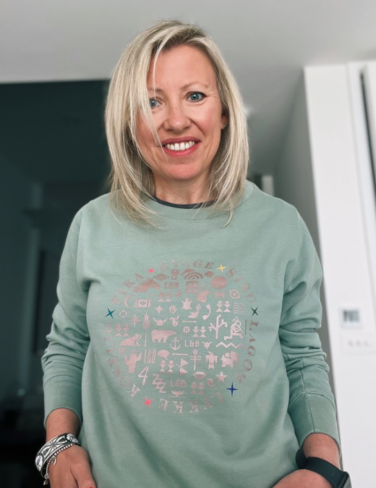 Woman wearing dusty green Scandi Sweat
