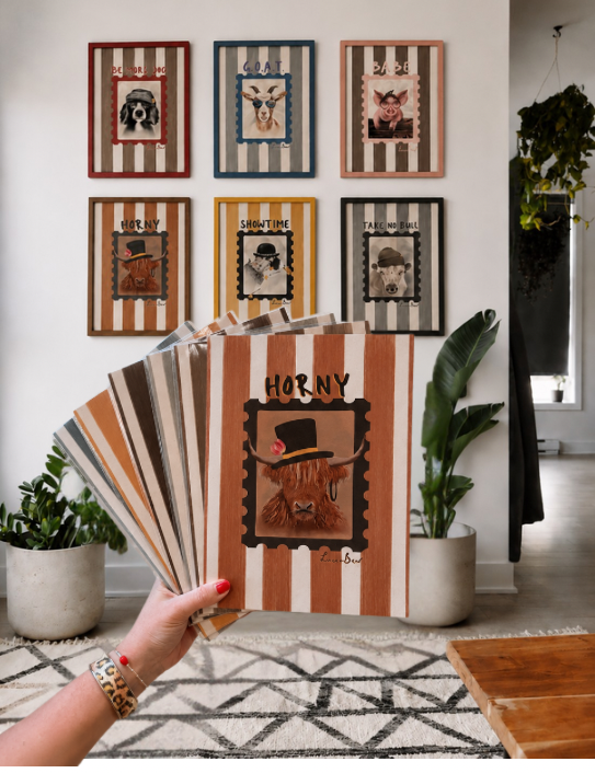 Horny Highland Cow Print and other Showtime Prints on wall