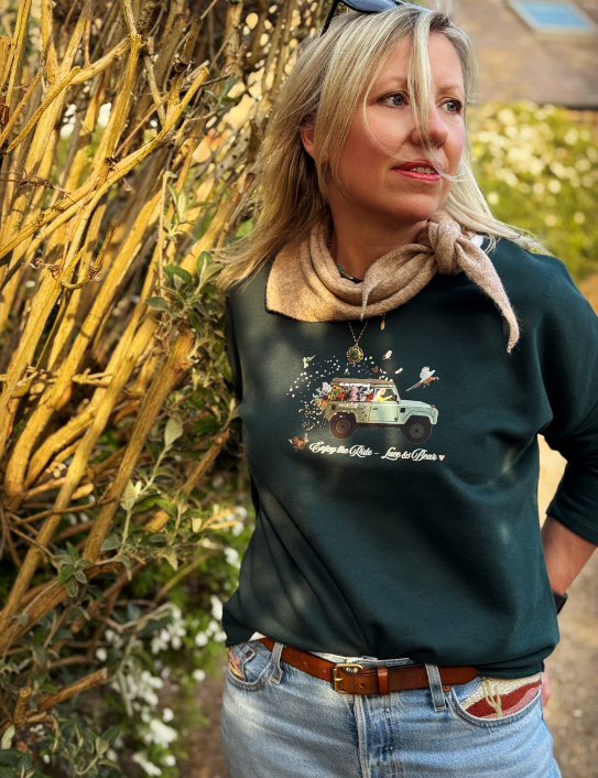 Woman wearing Forest green Enjoy the Ride Sweatshirt