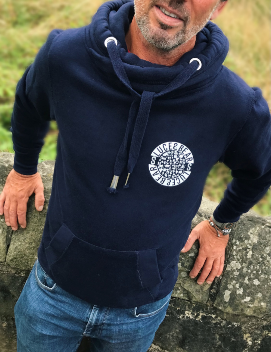 Man wearing navy unisex Power cross neck hoodie
