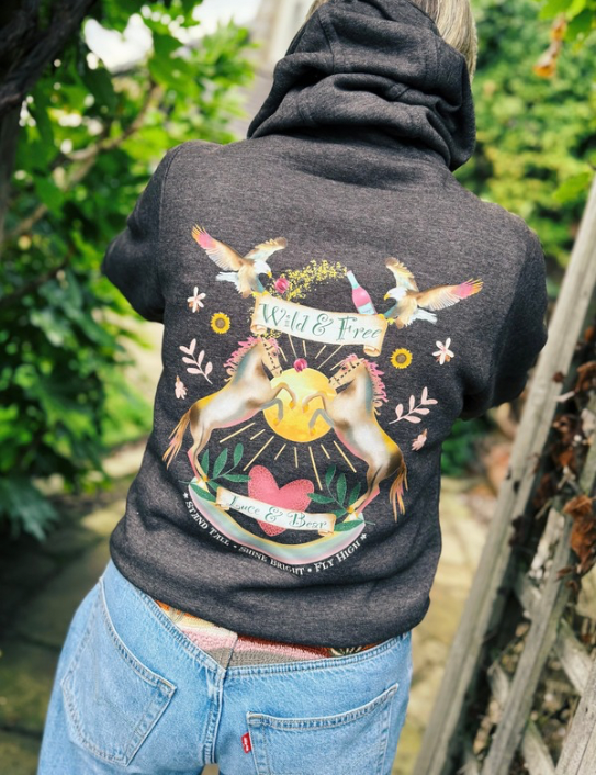 Woman wearing Wild and Free Zip Hoodie in vintage charcoal