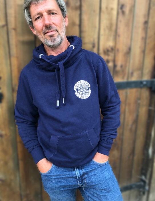 Man wearing navy unisex Power cross neck hoodie