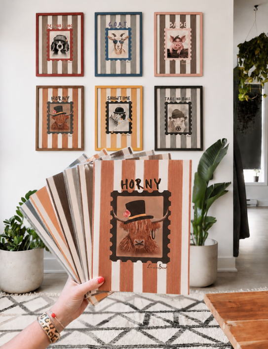 Horny Highland Cow Print and other Showtime Prints on wall