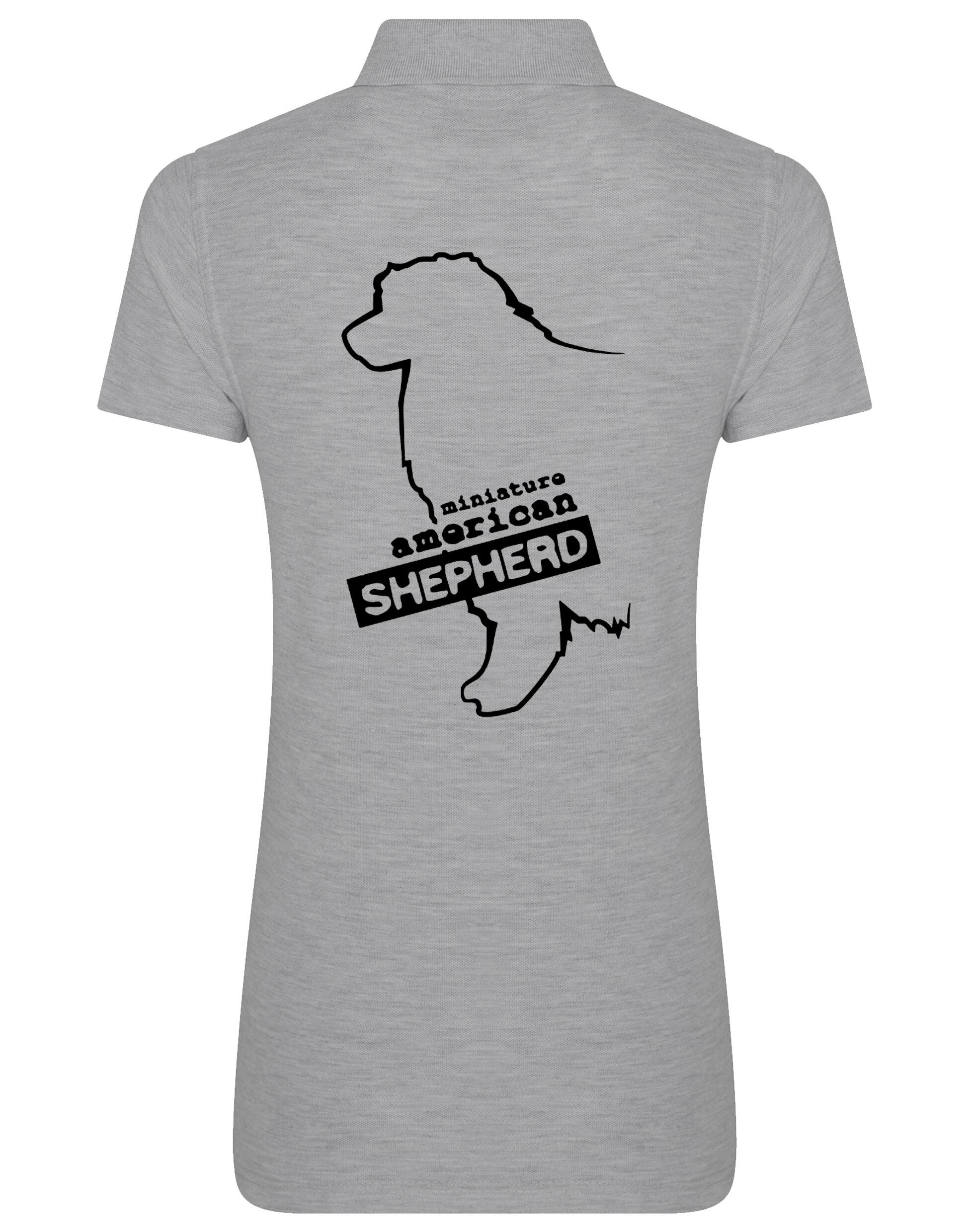 Miniature American Shepherd Women’s Cotton Polo featuring exclusive breed artwork, soft breathable fabric, and a flattering feminine fit.