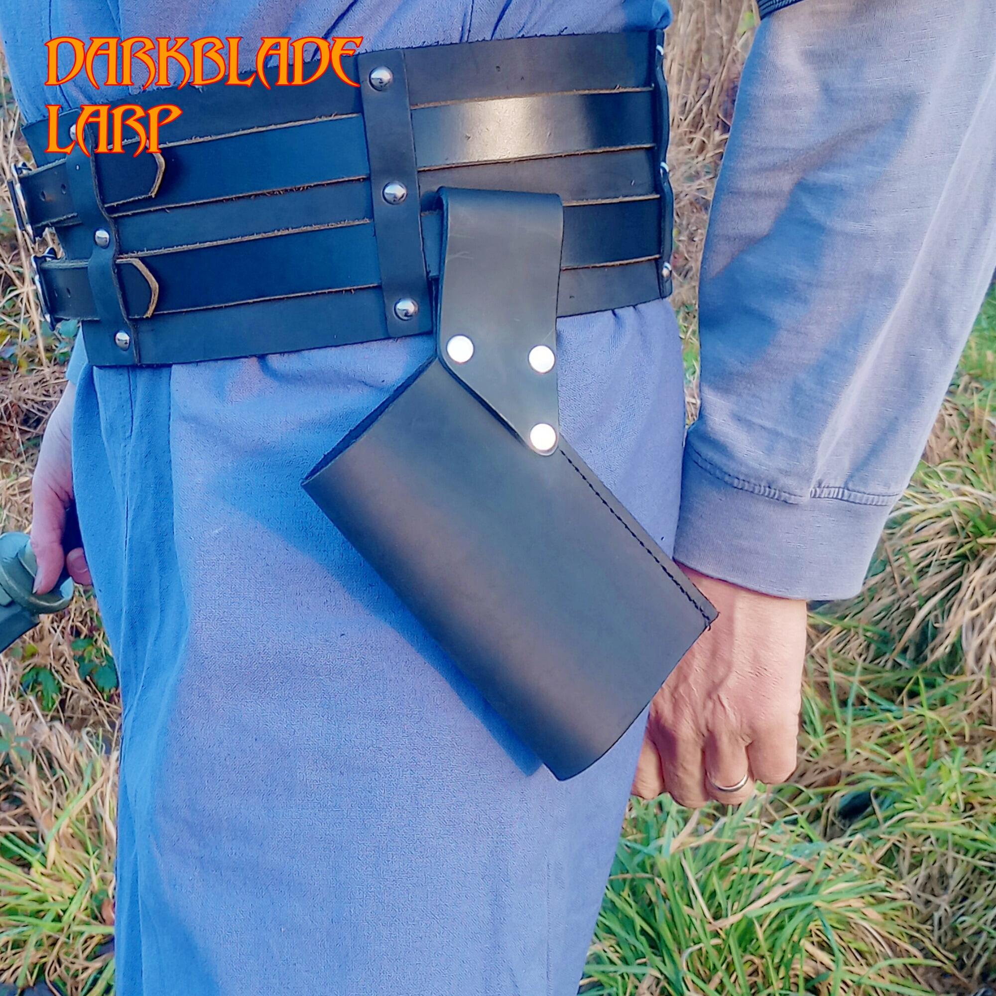 simple part scabbard set at an angle on the belt