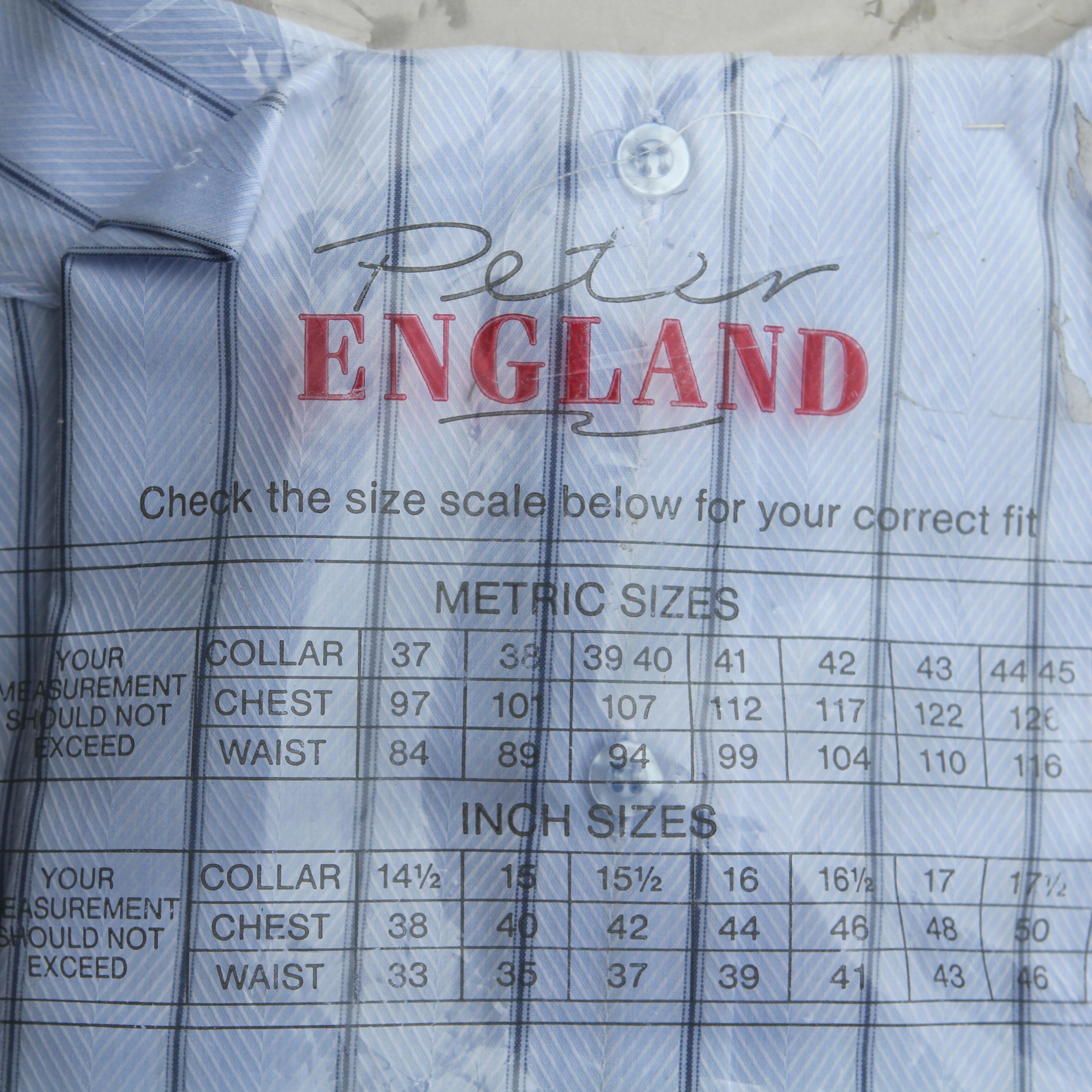 vintage 1980s unworn shirt, in blue with a black vertical stripe