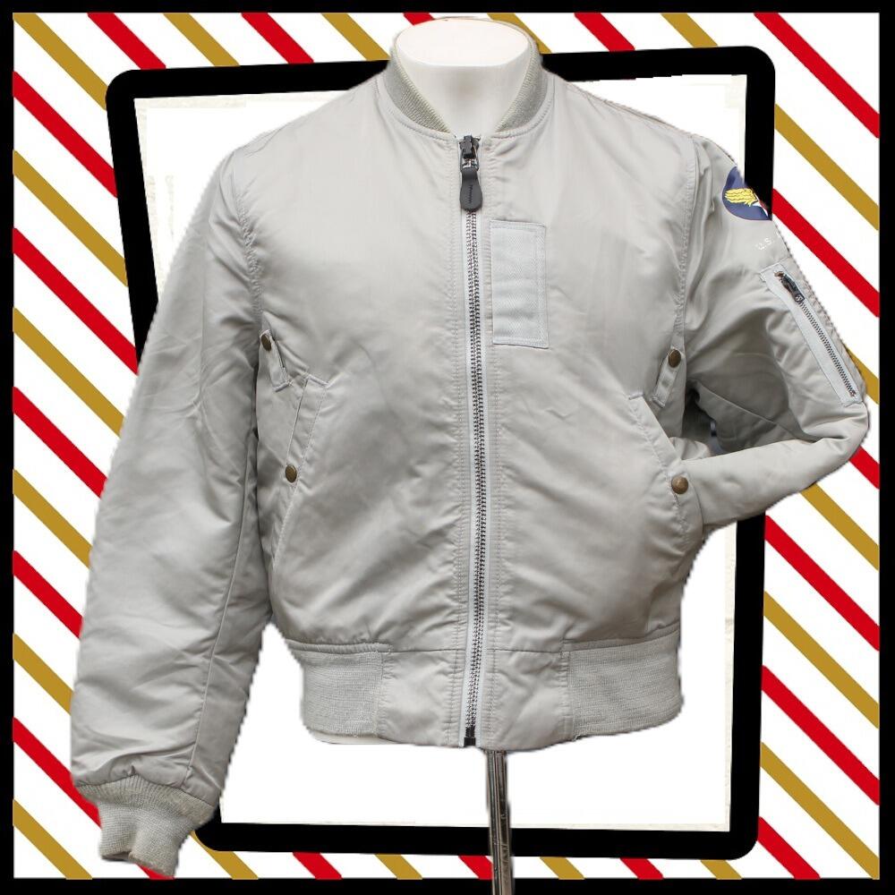 super cool Vintage I Spiewak & Sons Intermediate Flying MA-1 Bomber Reversible JACKET in light grey and black. Zip closure, ribbed collar, cuffs and waistband. Two hand pockets with press stud closure and a zipped pocket on the left arm, fully lined. Can be reversed so also has press stud pockets on the inside whichever way you choose to wear it. 100% nylon Made in USA