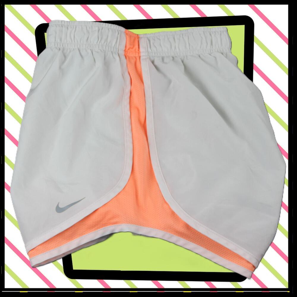 Nike lightweight sports shorts, in white with peach trim
