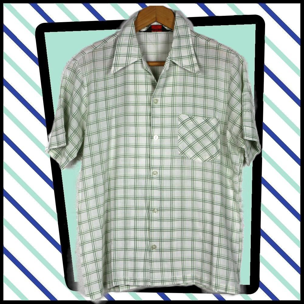 A cool shirt in green checks on a pale green background