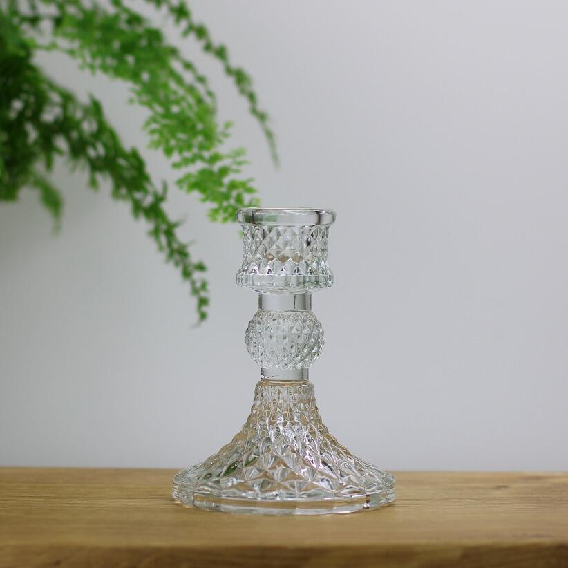 Small clear glass candlestick holder