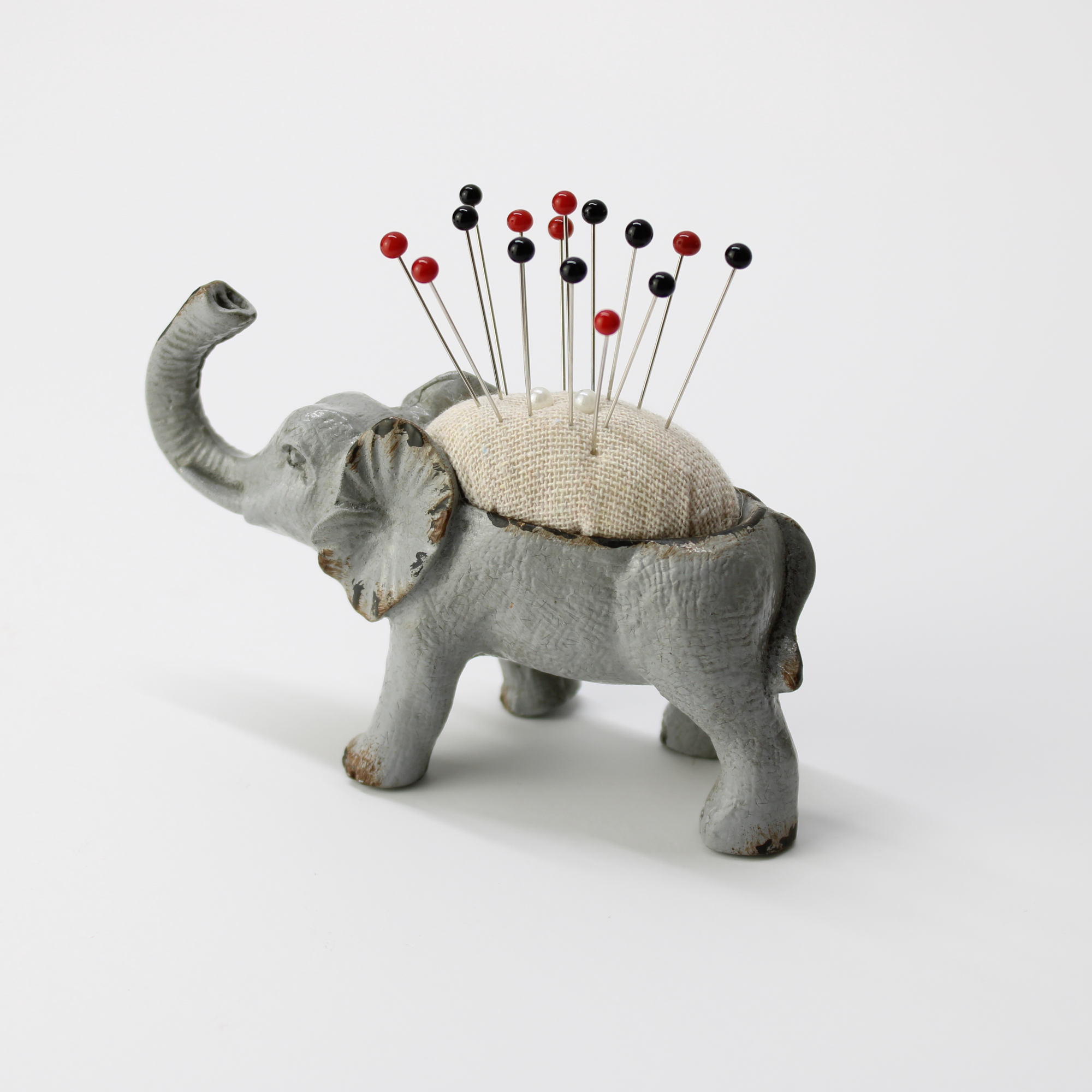 Rustic gray elephant pincushion for sewing needle storage