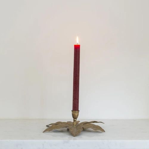Vintage style golden palm candle holder with candle
