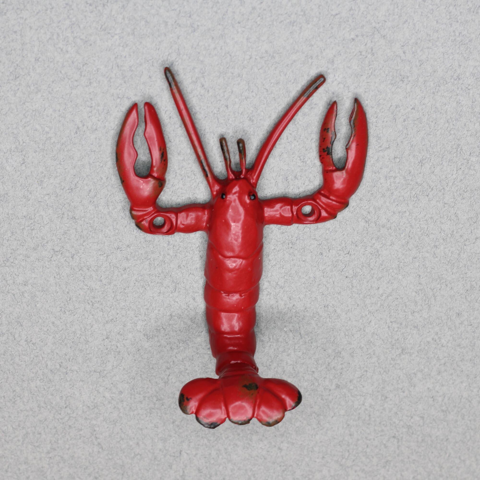 A red lobster wall hanger Perfect for beach houses, bathrooms, or entryways.