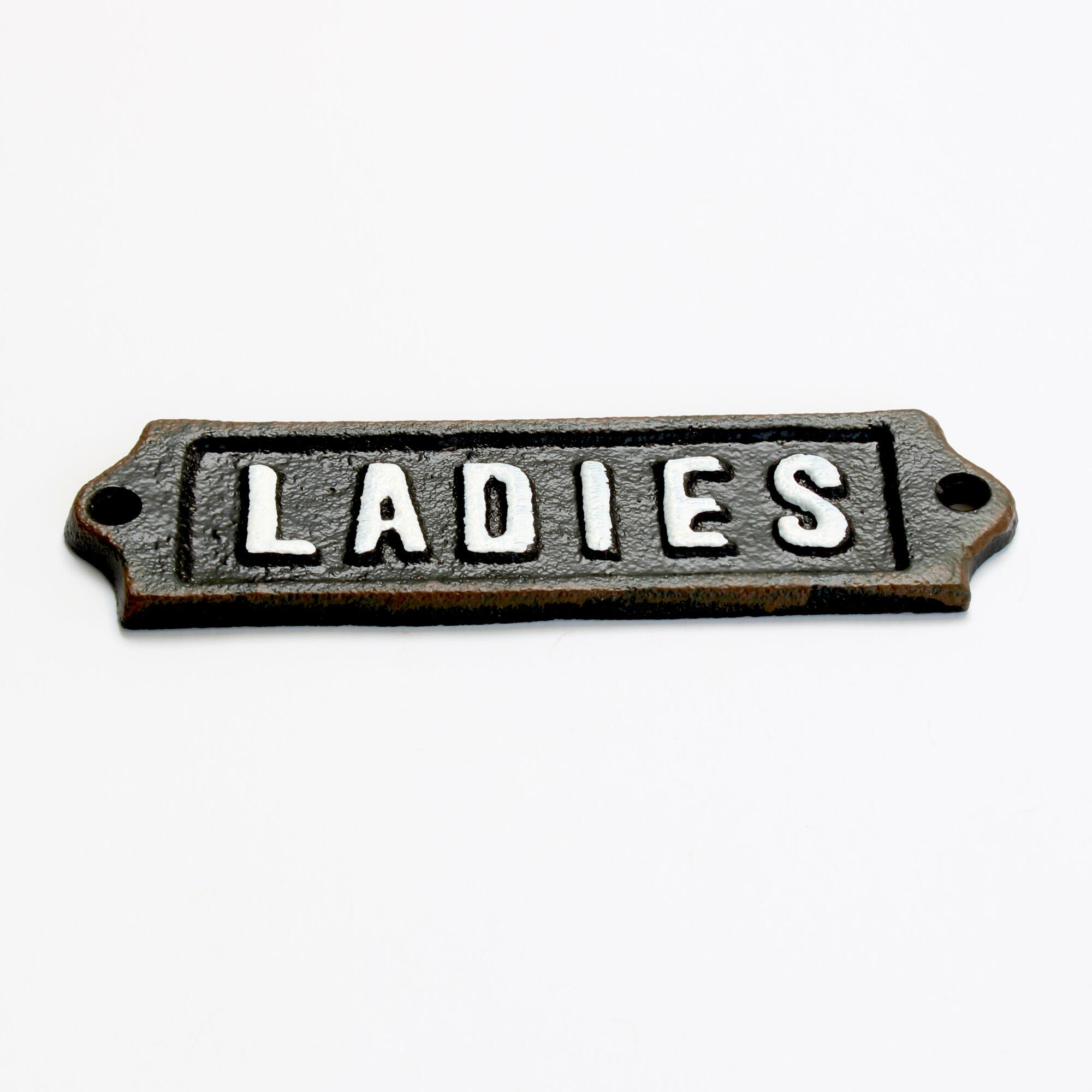 Antique style ladies washroom sign with embossed lettering detail