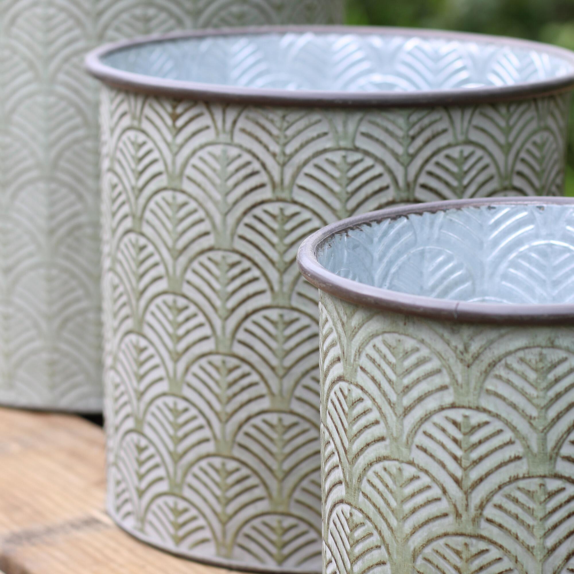 3 metal garden planters with vintage green finish.