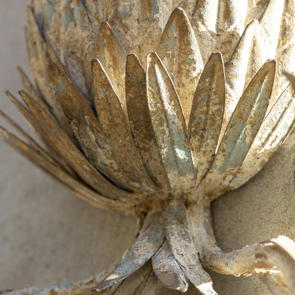 vintage sconce closeup of distressed layered paint finish