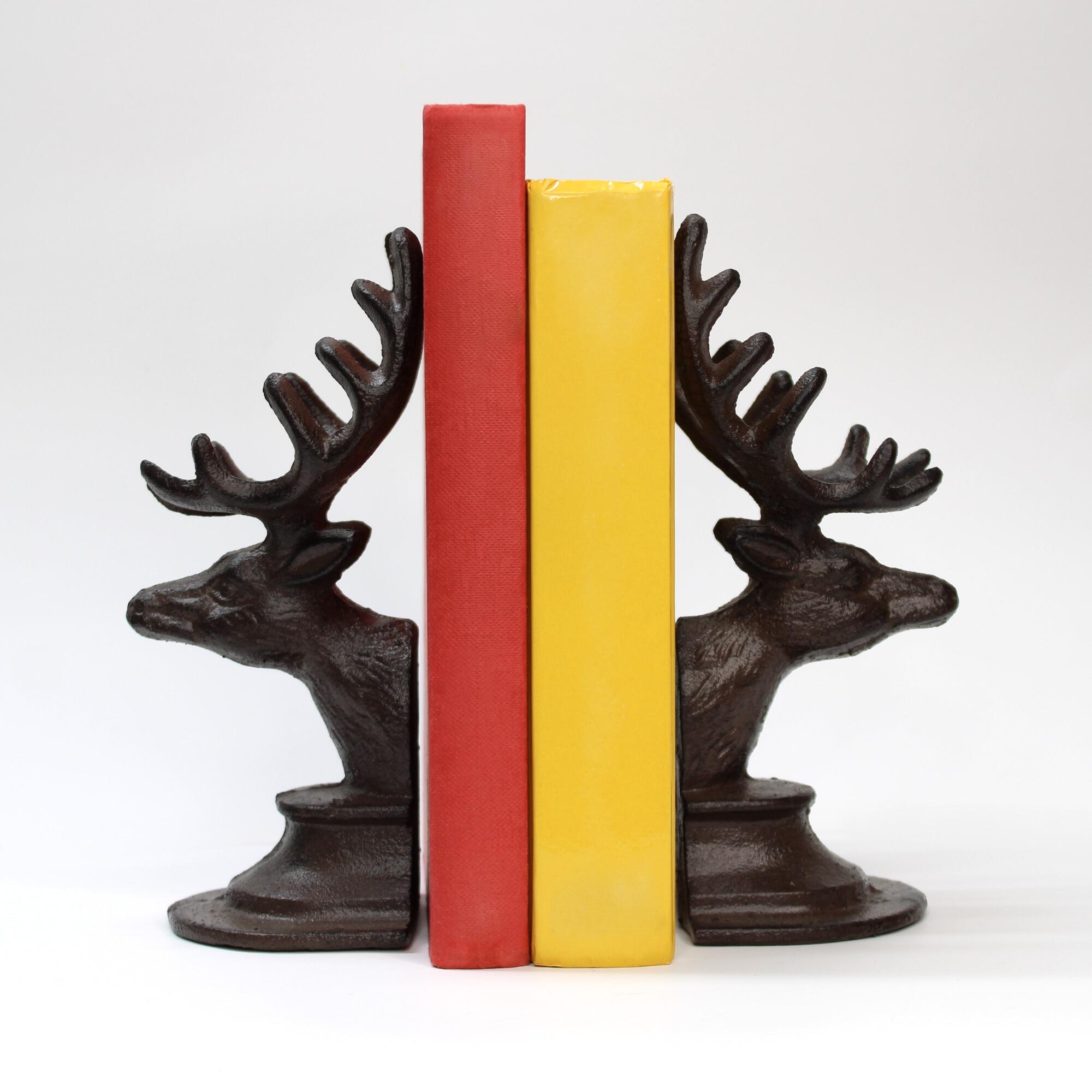 Cast iron stag head bookends with detailed antlers and a rustic finish.