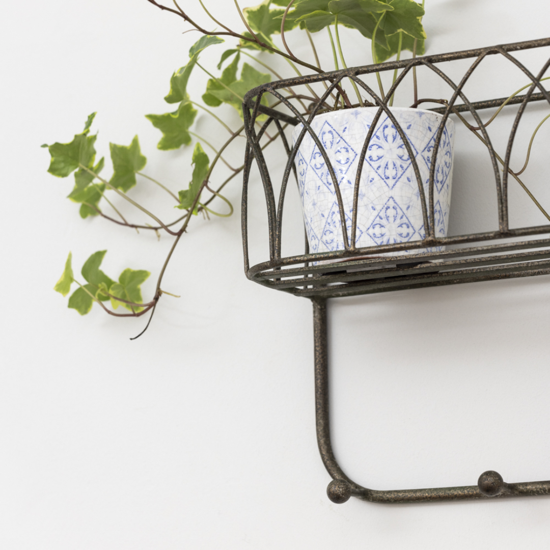 vintage metal coat rack with basket shelf