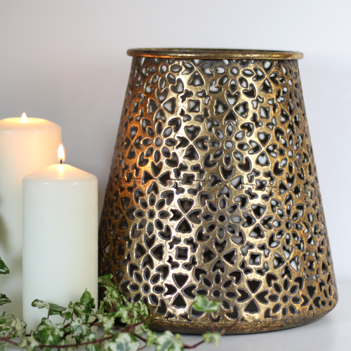 large rustic gold candle lantern with pillar candles and ivy