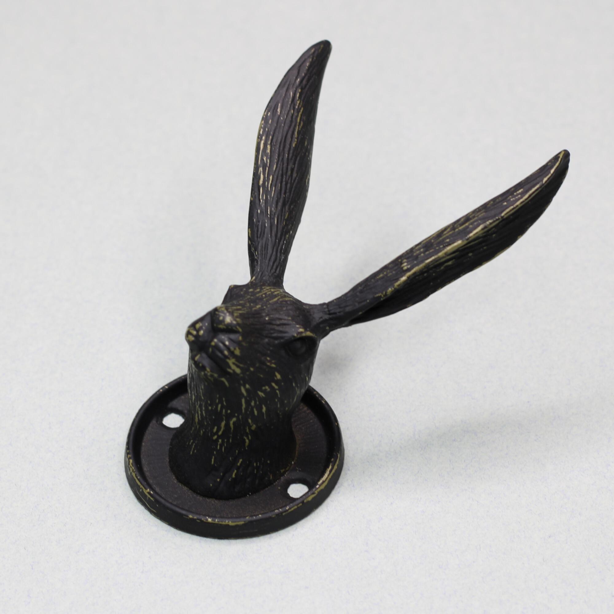 Antique style hare decorative hook for coats and hats, distressed black finish.