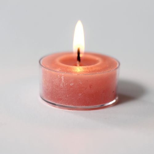 rustic pink coloured tea light candle