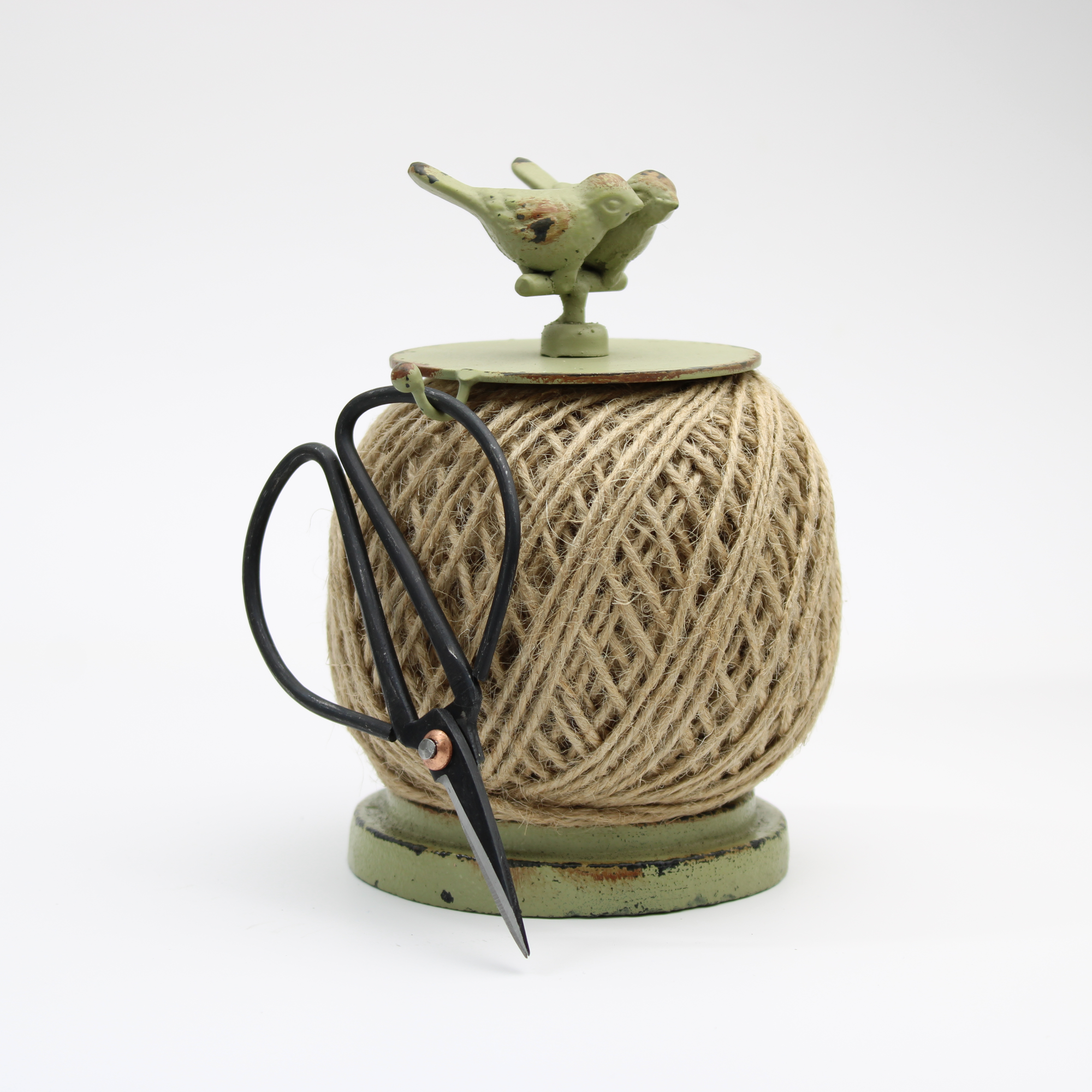 Rustic green bird string twine dispenser with natural jute twine and black scissors