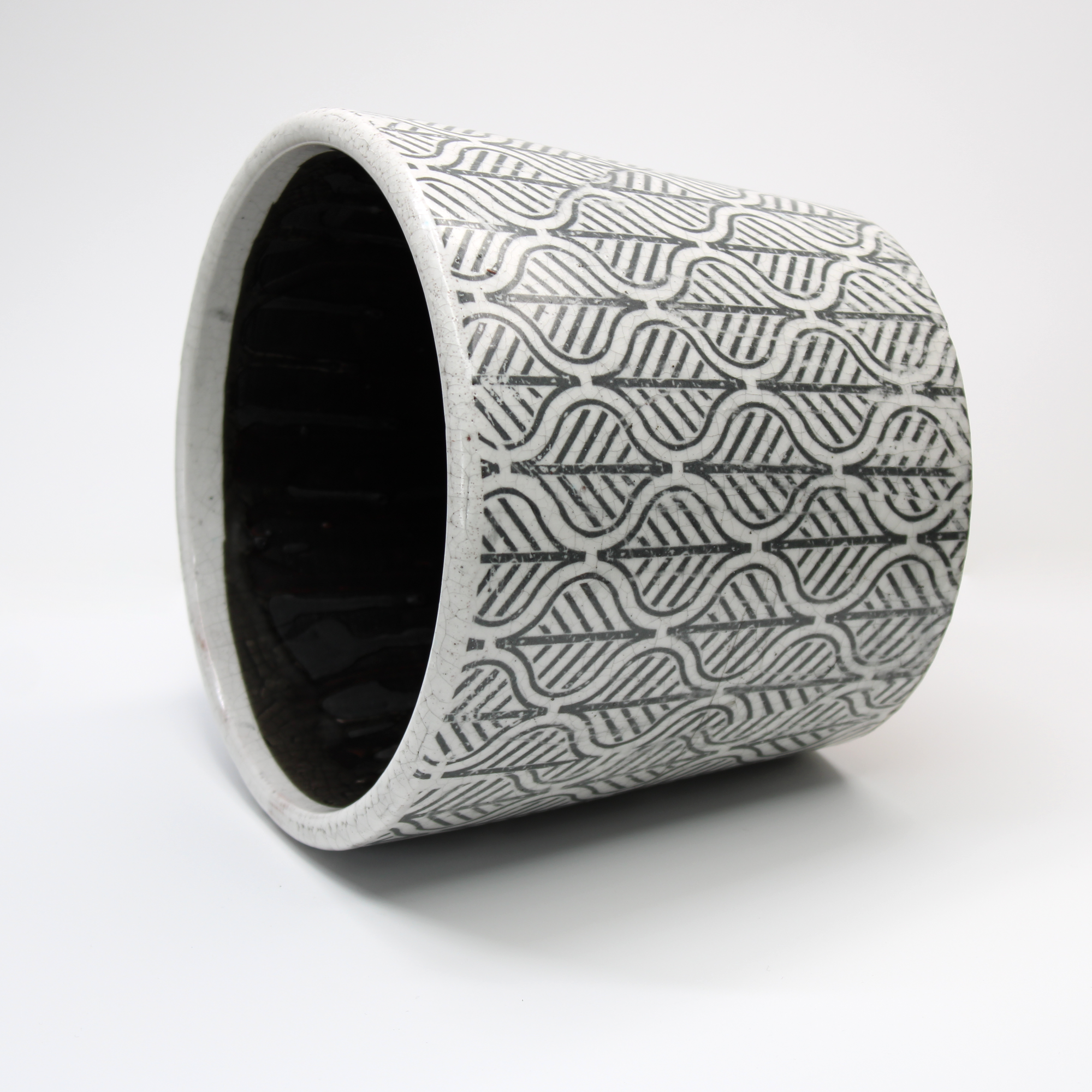 black and white plant pot with vintage style glazed finish